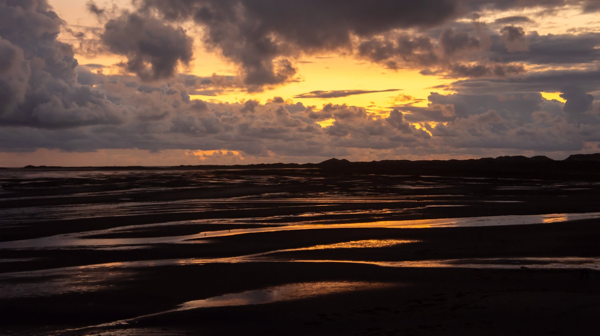 zonsondergang Waddenzee reflectie